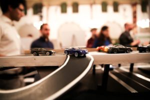 toy cars driving on a track