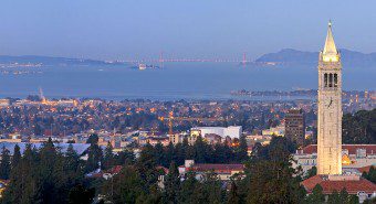 the Berkeley Campanile against the San Francisco skyline