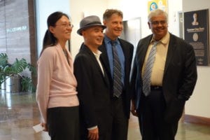Professor Xin Guo with Fung Institute staffs