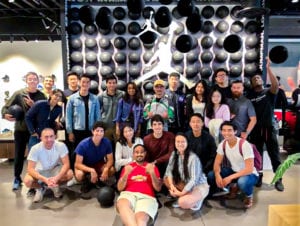 Group of MEng students poses for a photo in Jordan Jumpman store.